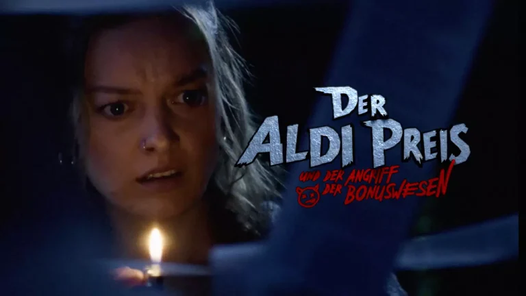 Standbild aus dem Aldi-Süd-Halloween-Spot: Eine junge Frau blickt erschrocken auf eine Kerze, daneben der Titel „Der Aldi Preis und der Angriff der Bonuswesen“.